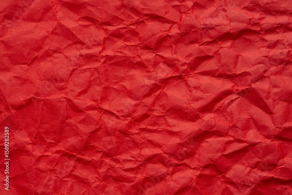 Obraz Macro red crumpled paper background,Red crumpled paper background, close up. Red sandy paper texture. Red wrapping paper as Christmas background.