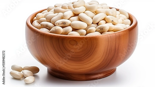 Fototapeta White beans fill a wooden bowl, some spilling onto the surface nearby isolated on transparent background