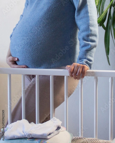 Obraz Future Mom Preparing Baby Space at Home
