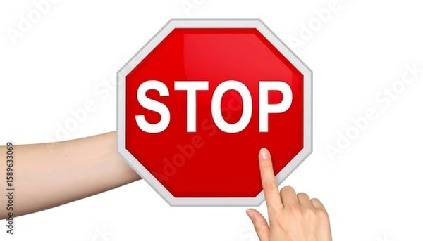 Obraz A hand pointing at a red octagonal stop sign