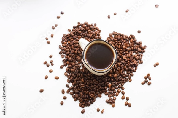 Obraz Coffee cup and coffee beans on a white background. A coffee house.