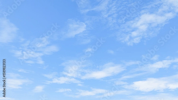 Fototapeta Clear blue sky with soft cloud with daylight natural background. Soft white clouds float in the clear blue sky. Clear blue sky, bright spring, soft sky gradient.