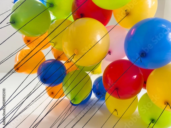 Fototapeta Colorful baloons with black strings