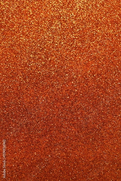 Obraz Blurred shiny orange glitter texture background