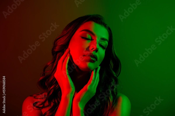Obraz Close up photo of attractive lovely girl model enjoying soft face skin isolated multicolor red green neon background