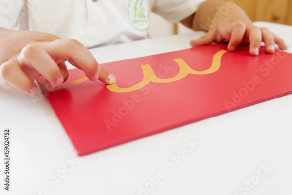 Obraz Child learning alphabet letters