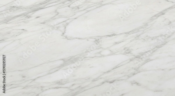 Fototapeta Close-up shot showcasing the intricate veining and patterns of a white marble surface, creating an elegant and luxurious texture.