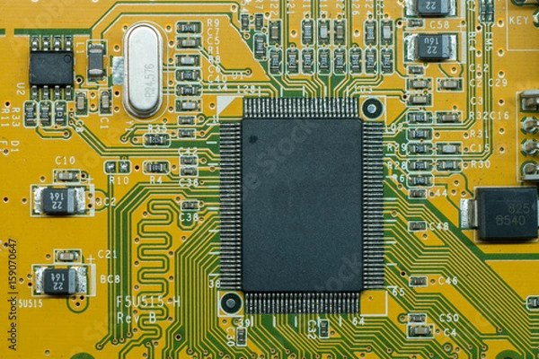 Fototapeta Close up of electronic multi layer circuit board, PCB, with microchip and components