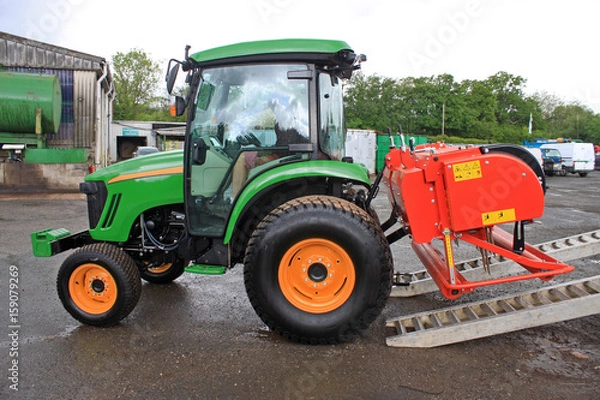 Fototapeta Tractor offloading