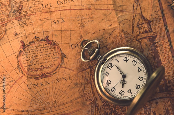 Fototapeta pocket watch  or pendant watch on vintage map background (watch)