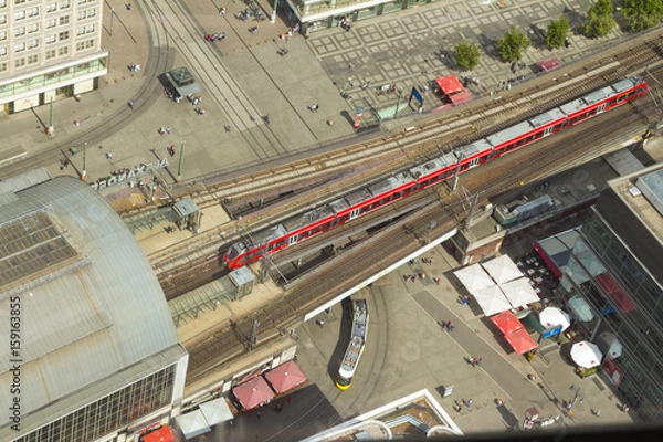 Obraz Aerial view of the S-Bahn tracks rapid train and tram train at the Alexanderplatz public square in Berlin