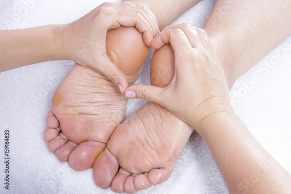 Fototapeta Masaż głęboki stóp. 