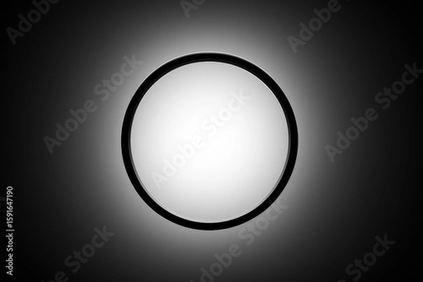Fototapeta Minimalist monochrome presentation of a circular shape on a gradient, showcasing light and shadow in simple design.