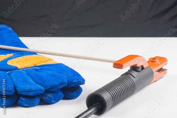 Obraz Welding gloves and holder