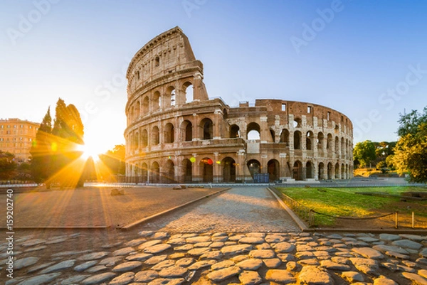 Fototapeta Koloseum o wschodzie słońca, Rzym, Włochy, Europa. Rzym starożytna arena walk gladiatorów. Koloseum w Rzymie to najbardziej znany zabytek Rzymu i Włoch