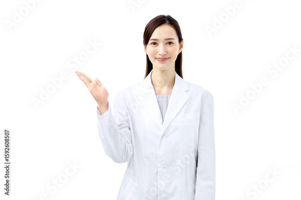 Obraz 説明する医師　白衣の女性　医療従事者