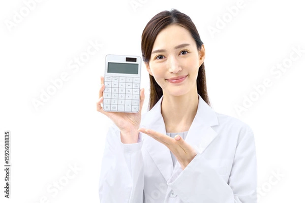 Obraz 計算機を持った白衣の女性 医療従事者　医療費