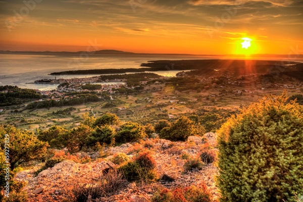 Obraz Sunset over the island and city of Rab in the Adriatic sea, Croatia