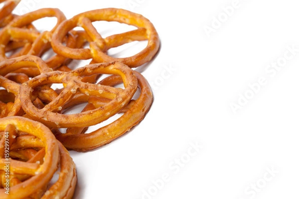 Fototapeta glazed and salted pretzels isolated on white background