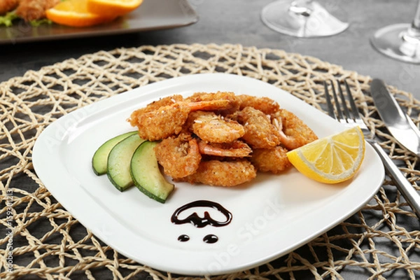 Obraz Plate with delicious coconut shrimps on table