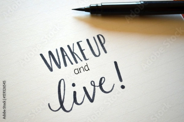 Fototapeta Hand lettered quote “WAKE UP AND LIVE!”