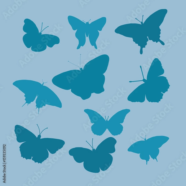 Fototapeta Blue silhouettes of butterflies on a gray background. A flat vector image of a silhouette of butterflies. Butterfly logo. Set of elegant butterflies