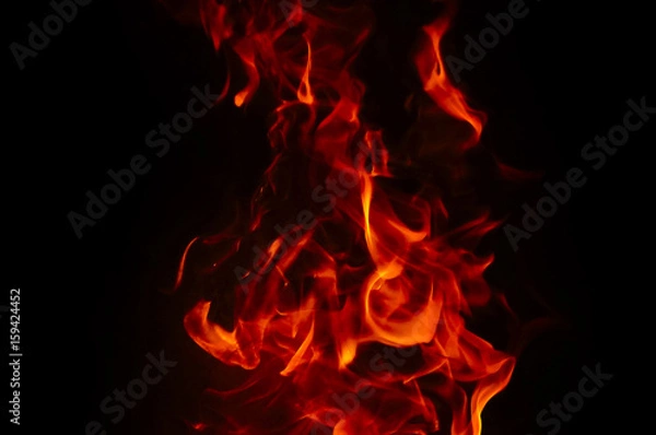 Obraz Fire Texture With Motion Blur Effect Over Black Background