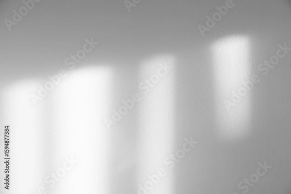 Fototapeta Grey shadow and light blur abstract background on white wall texture, Background room interior concrete wall with window light, dark gray shadows for product design,Backdrop monochrome banner
