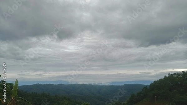 Fototapeta clouds over the mountains