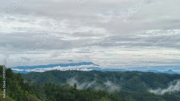 Fototapeta clouds over the mountains