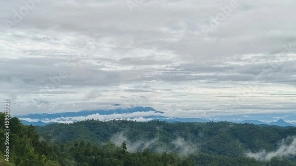 Fototapeta clouds over the mountains