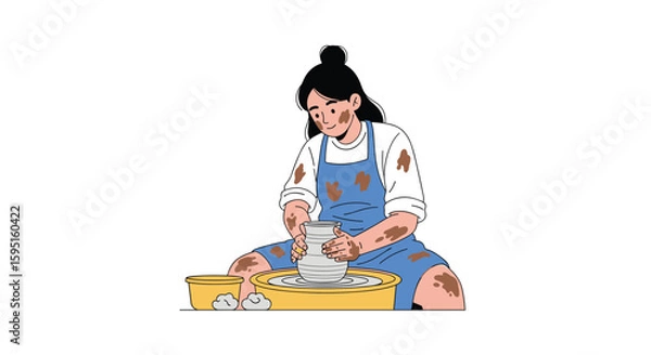 Fototapeta A dedicated artisan focused on shaping a unique ceramic piece on a pottery wheel during a creative session crafting handmade earthenware