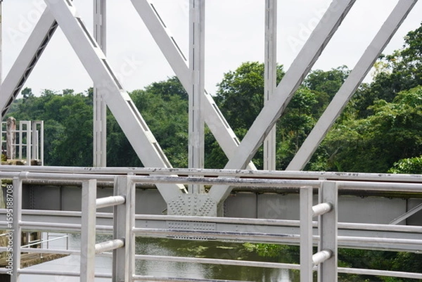 Obraz Steel Truss Bridge Over River – Structural Engineering Detail