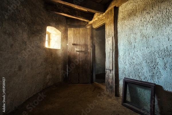 Fototapeta Old door in abandoned building