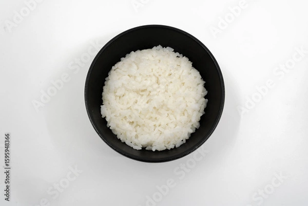 Fototapeta 검은 그릇에 담긴 흰 쌀밥 한 공기

