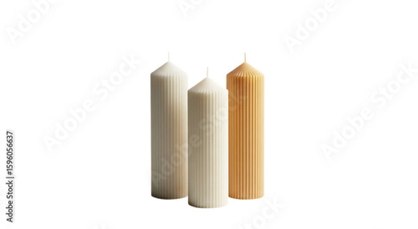 Fototapeta Three tall candles of varying textures and colors on a white background