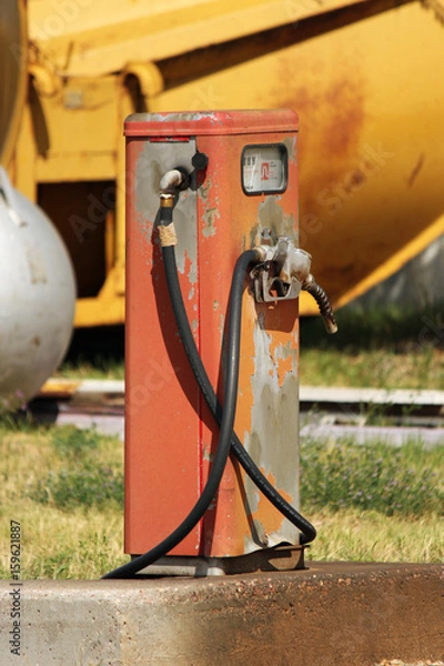 Obraz Old gas pump on concrete base