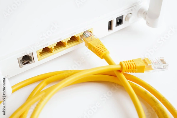 Fototapeta Ethernet cable with wireless router connect to internet service provider network.