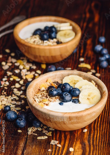 Fototapeta Healthy Breakfast with Granola, Banana and Blueberry.