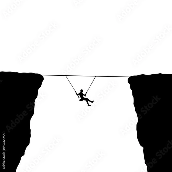 Fototapeta Silhouette of person on swing between two cliffs representing balance and fear  