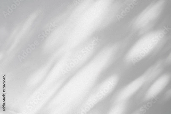 Obraz Light and shadow of leaf abstract grey background. Natural shadows and sunshine diagonal refraction on white concrete wall texture. Shadow overlay effect for foliage mockup, banner graphic layout