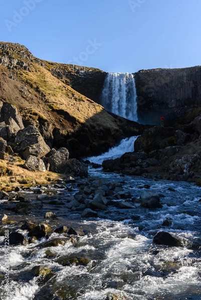 Obraz Photographer taking pictures of Svodufoss waterfall in Iceland