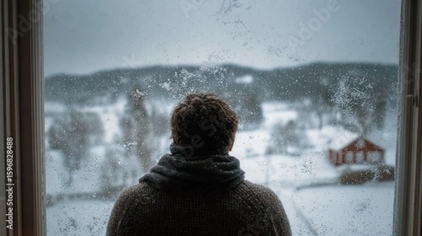 Obraz Person looking at snowy landscape through window