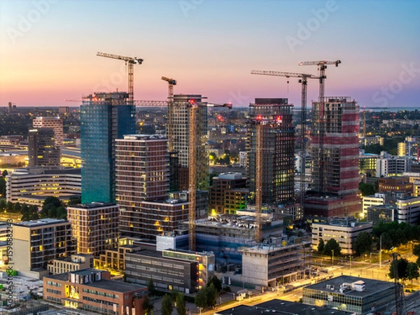 Obraz Amsterdam South high-rises under construction at sunset