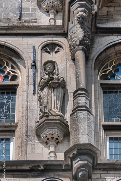 Fototapeta Old Town Hall of Gouda (Stadhuis van Gouda, 1448 - 1450), it is one of oldest Gothic city halls in the Netherlands. Architectural fragments of the facade. Gouda, the Netherlands.