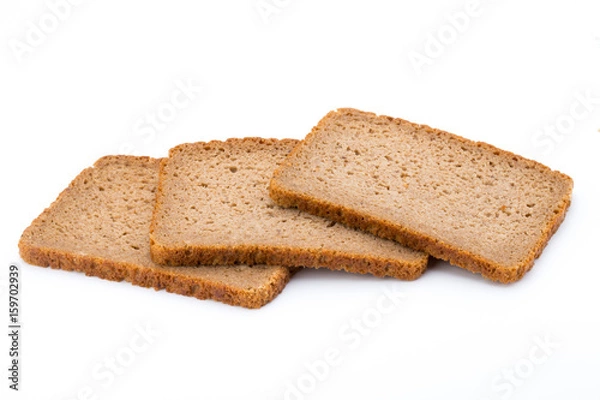 Fototapeta Slices of rye bread isolated on white background.