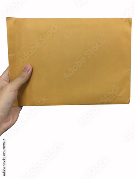 Obraz Hand hold brown envelope isolated on white background