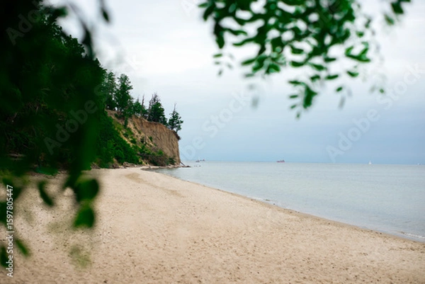 Fototapeta View of the sea cliff. Beach. Relaxation by the sea.