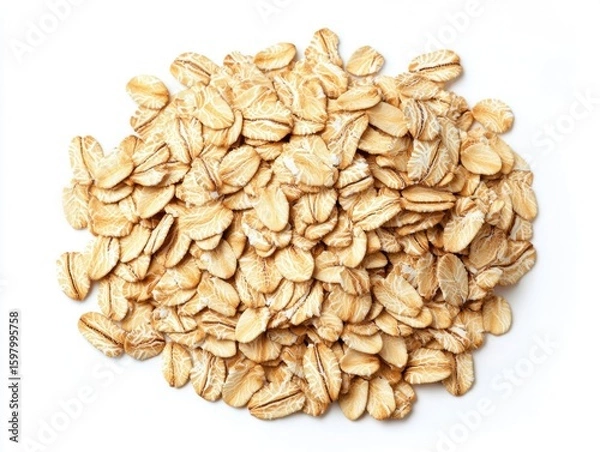 Fototapeta Rolled oats are spread out on a white surface, showcasing their rough texture and natural color. Ideal for various recipes, these oats are nutritious and versatile.