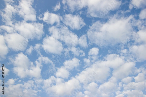 Obraz Transparent blue sky with clouds and atmospheric afternoon.
